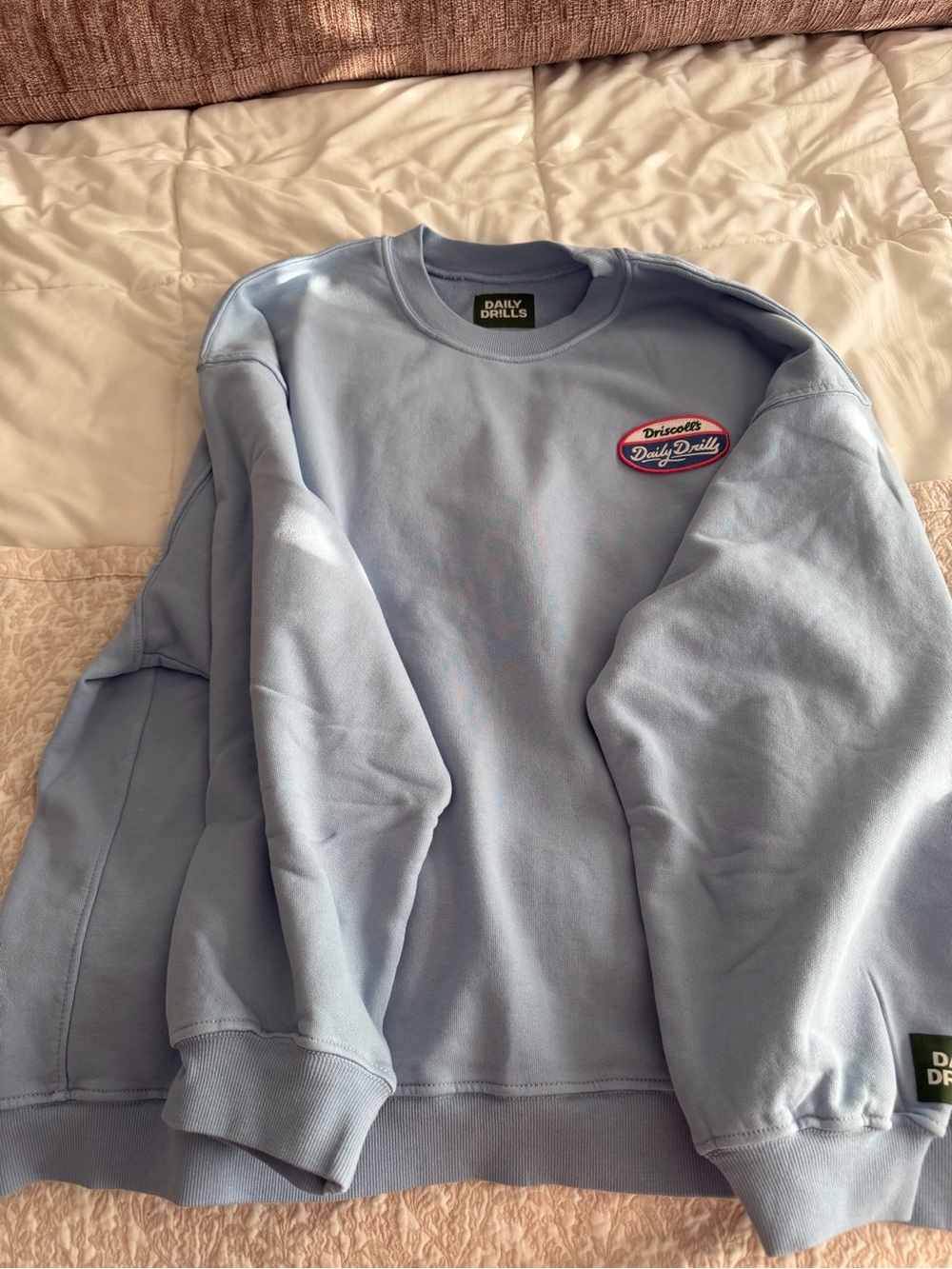 Daily Drills Driscoll’s Light Blue Crewneck Sweatshirt